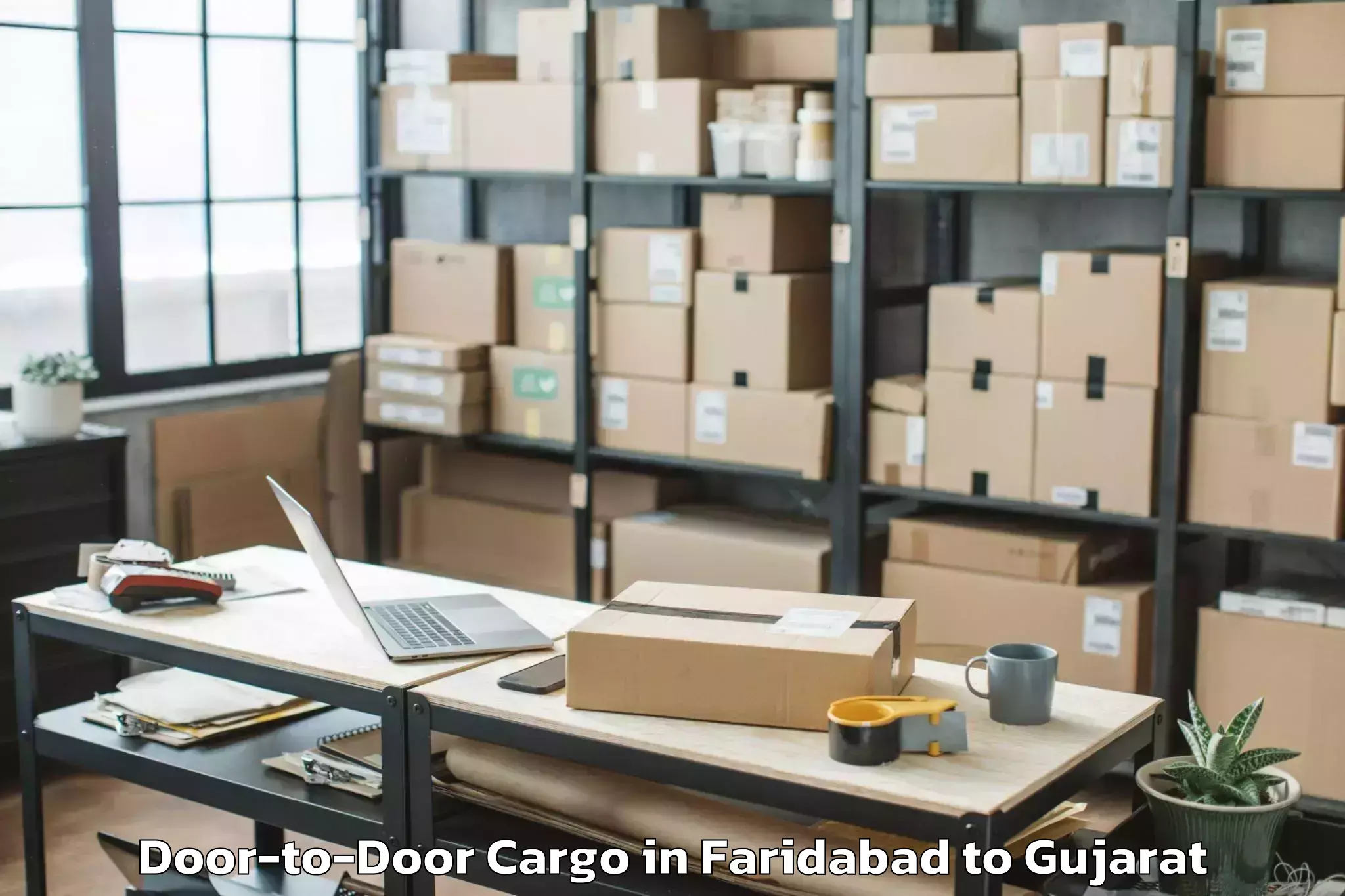 Book Your Faridabad to Karjan Door To Door Cargo Today